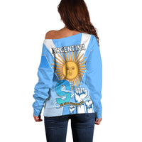 Womens off-shoulder blue sweater back with ARGENTINA text and sun graphic