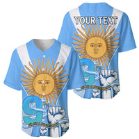 Two blue baseball jerseys with white V-strap and sun graphic; one shows 'YOUR TEXT'