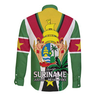 Green long sleeve button shirt with back crest and 'SURINAME' text