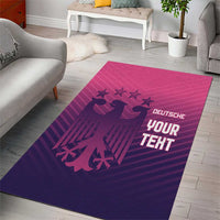 Purple area rug with pink glowing line, German text and bird silhouettes on wood floor