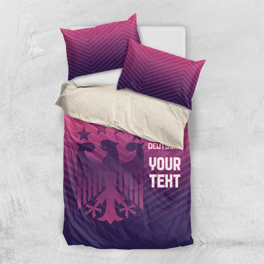 Pink and purple football bedding set with 'YOUR TEXT' and 'DEUTSCHE' on quilt
