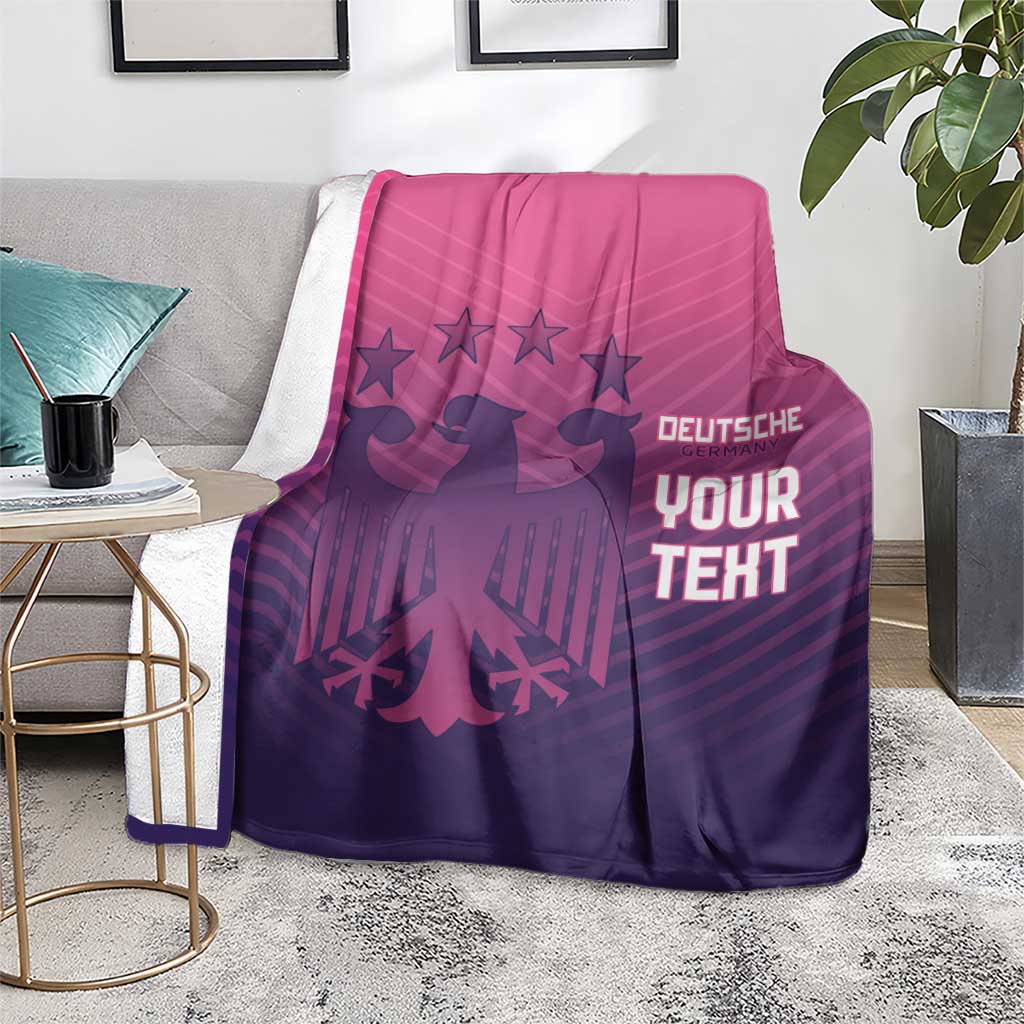 Football-themed blanket on a gray couch, pink top to dark purple with 'YOUR TEXT'