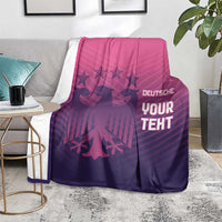 Football-themed blanket on a gray couch, pink top to dark purple with 'YOUR TEXT'