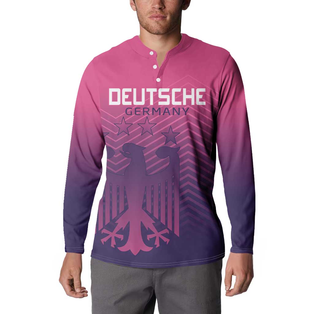 Pink quarter-zip button sweatshirt with DEUTSCHE GERMANY front graphic on model