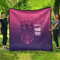 Pink and dark blue quilted blanket with diamond pattern and glowing 'YOUR TEHT' text