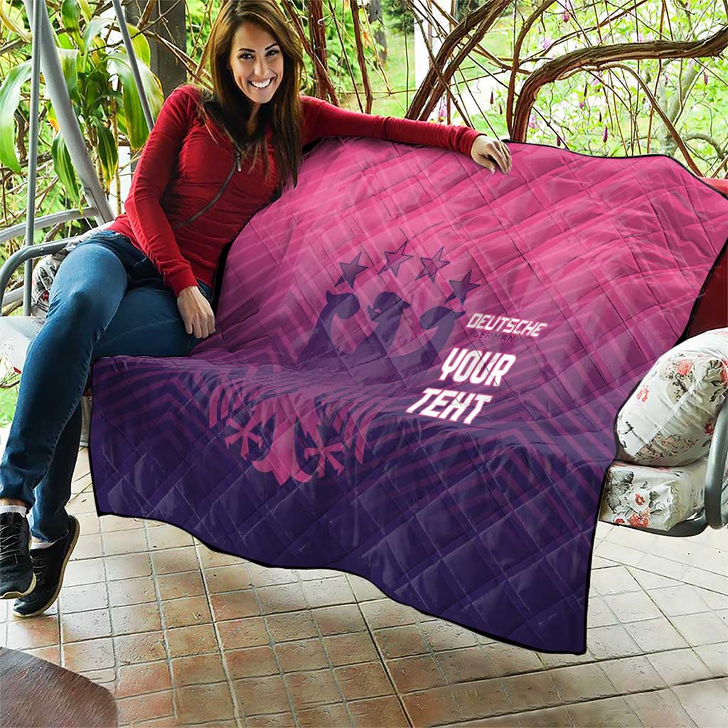Pink and dark blue quilted blanket with diamond pattern and glowing 'YOUR TEHT' graphic