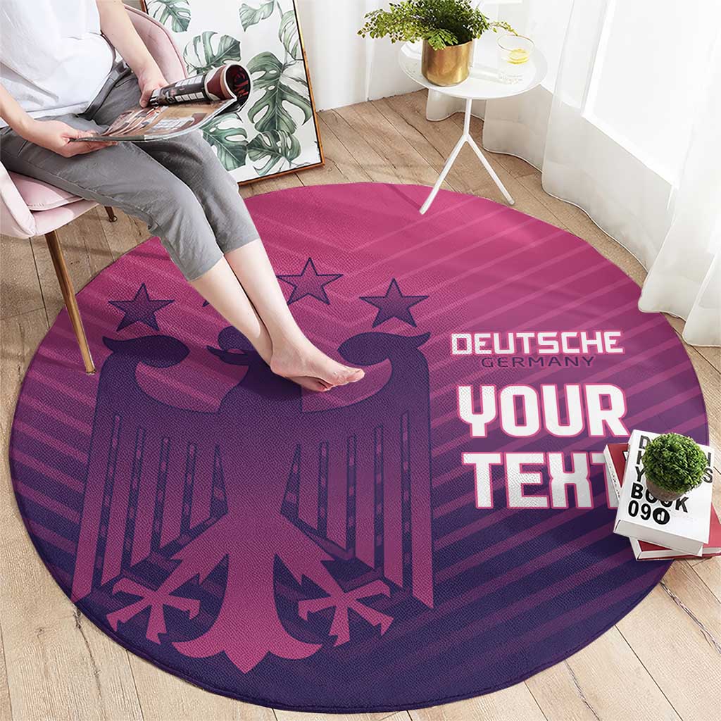 Round area rug with purple-pink striped print, stars, and “DEUTSCHE YOUR TEHT”