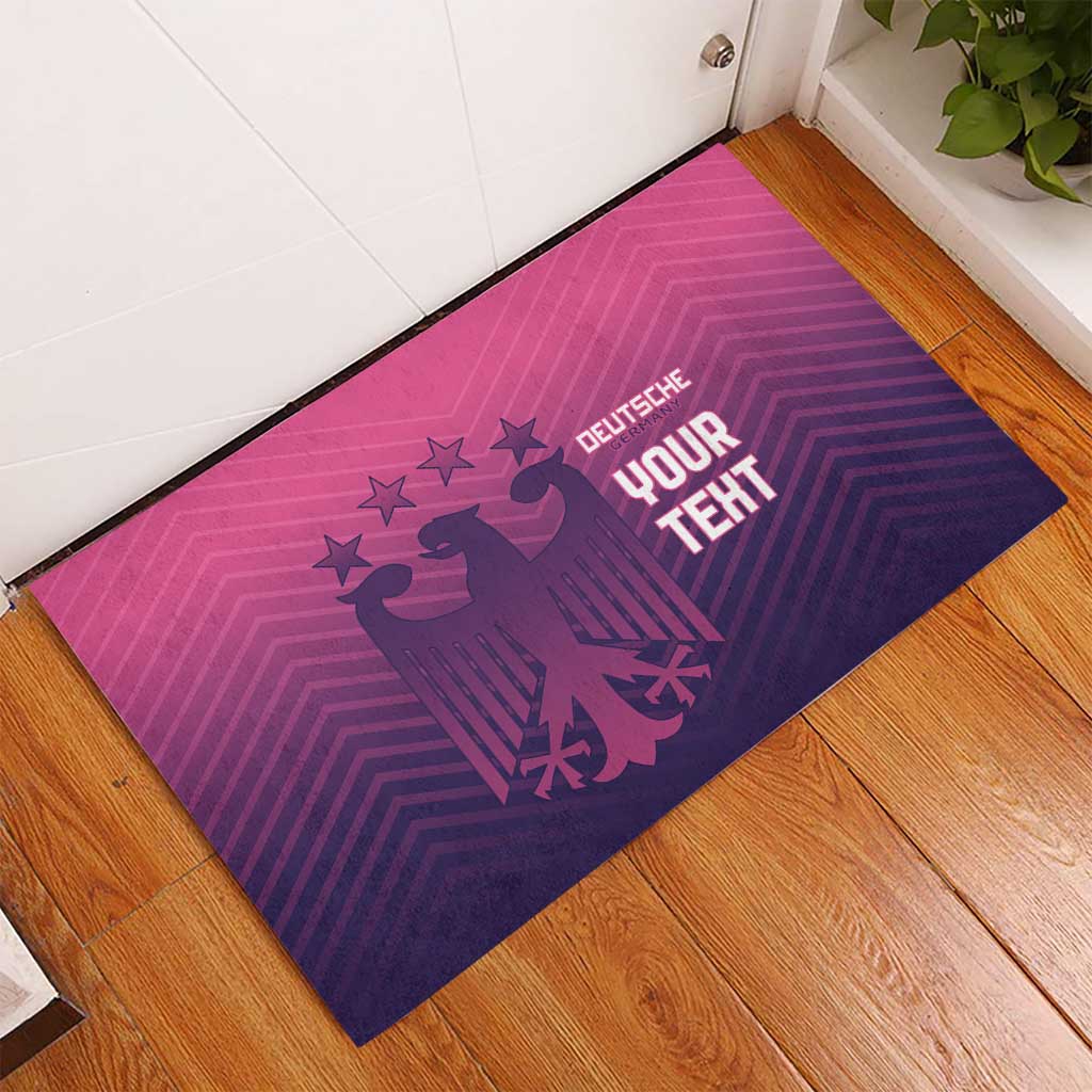 Purple rubber doormat with pink line pattern, eagle emblem and DEUTSCHE YOUR TEXT