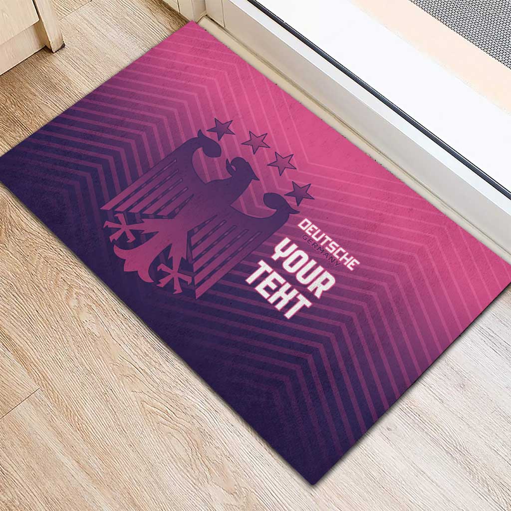 Dark purple rubber doormat with pink geometric pattern and eagle logo, YOUR TEXT