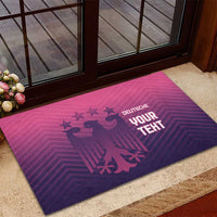 Purple rubber doormat with pink line and eagle graphic, DEUTSCHE YOUR TEXT