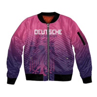 Pink bomber jacket with front zip, ribbed cuffs, and graphic football-style patch