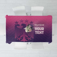 Pink and purple football tablecloth with star and crest print and decorative text