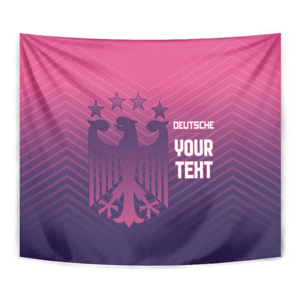 Folded pink and purple wall tapestry with German eagle emblem, stars, 'DEUTSCHE YOUR TERT'.
