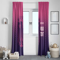 Pink and dark purple football window curtains framing a doorway with crest and text