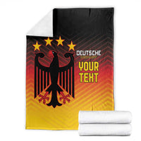 Folded football blanket, black-red-yellow eagle and stars design with 'DEUTSCHE' and 'YOUR TEXT'