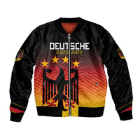 Black bomber jacket with front zip, Germany eagle and star graphic on gradient red-yellow