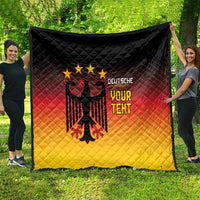 Gradient quilt blanket with black eagle crest, gold stars, and “DEUTSCHE YOUR TEXT” print