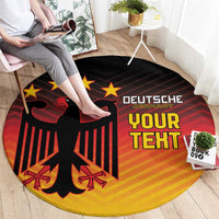 Round Germany football-themed rug with red eagle and stars on black, yellow gradient