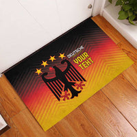 Rectangular rubber doormat with eagle graphic on red-to-yellow gradient, black border