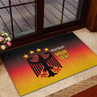 Doorway rubber doormat with black border and eagle design on red-to-yellow gradient