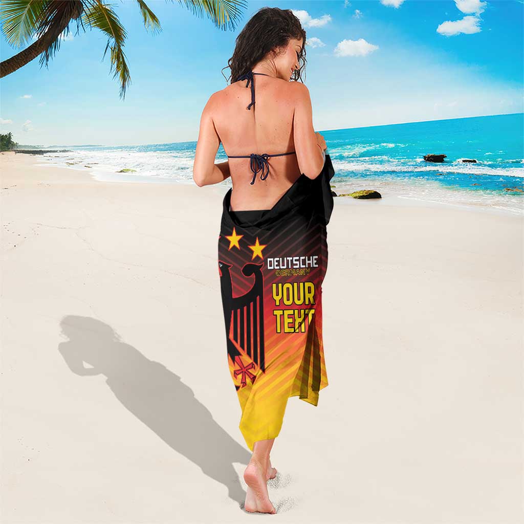 Germany football sarong worn at the back; eagle crest with “DEUTSCHE” and “YOUR TEXT”