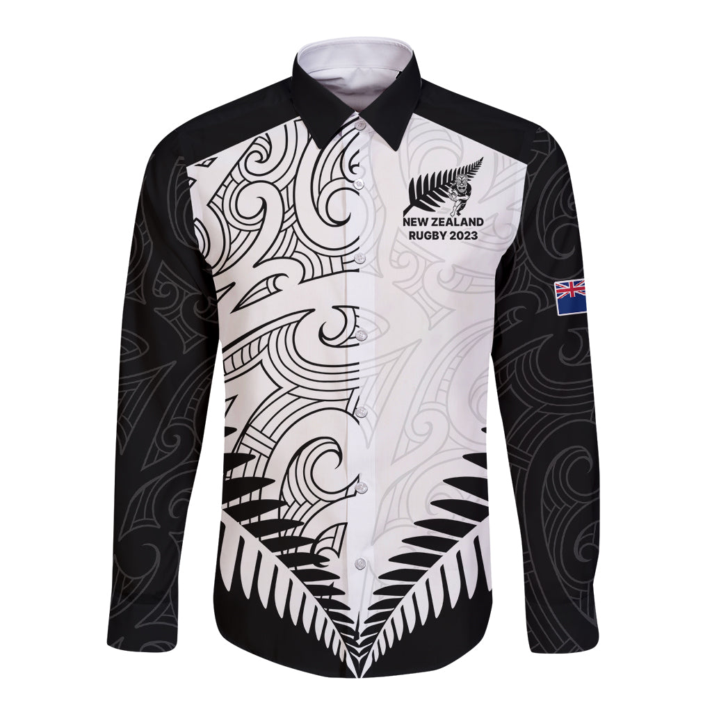 Black long-sleeve rugby button shirt with white tribal koru design and NZ Rugby 2023 logo
