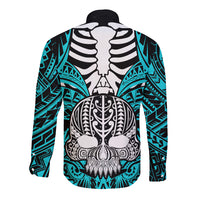 Back of aqua long-sleeve button shirt with large boar skull tribal artwork graphic