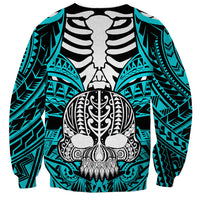 Unisex aqua sweatshirt with black-and-white boar tusk skull graphic and ornamental geometric sleeves