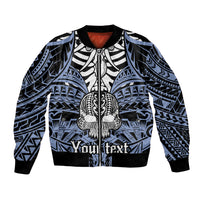 Blue bomber jacket with black, white skull graphic, ribbed collar and cuffs