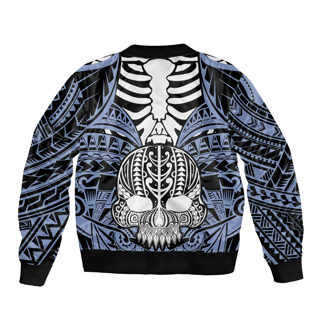 Blue bomber jacket with large central skull and bone graphic, ribbed hem and cuffs