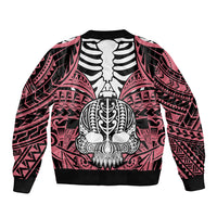 Pink bomber jacket with black ribbed cuffs and back print of skull and tusks