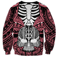 Pink unisex skull sweatshirt with large black boar-tusk graphic and tribal front patterns