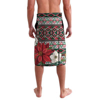 Men's black Christmas tribal print swim shorts with poinsettia, rear view