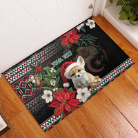 Black Christmas rubber doormat with fennec fox Santa, poinsettia flowers, and geometric border