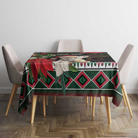 Christmas tablecloth with fennec fox and geometric pattern in black, red, and green