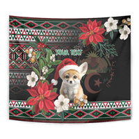 Close view of black Christmas tapestry with fennec fox Santa, poinsettias, and “Your text”