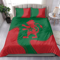 Red and green duvet and pillowcase set with Moroccan lion emblem and star design