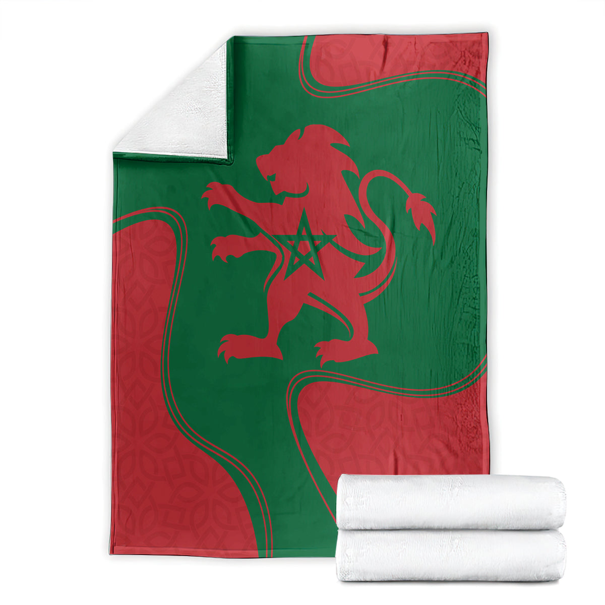 Red and green lion emblem blanket with flag pattern, stacked with white towels