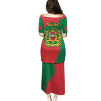 Red and green long dress, back view, yellow crest and text, short sleeves