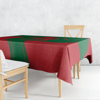 Morocco proclamation day tablecloth, red and green, draped over a table with bold emblem