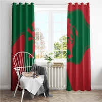 Green and red Morocco flag curtains with grommet-style top rings on a rod.