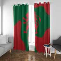 Green and red Morocco flag curtains with hanging loop top, installed over a window.