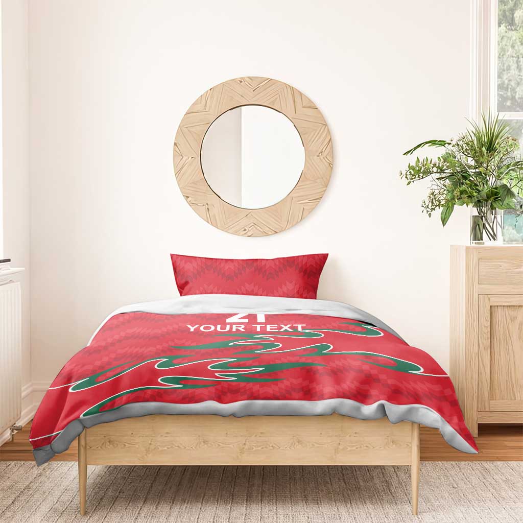 Red duvet and matching pillow set with green graphic; "21" and "YOUR TEXT" on bedding