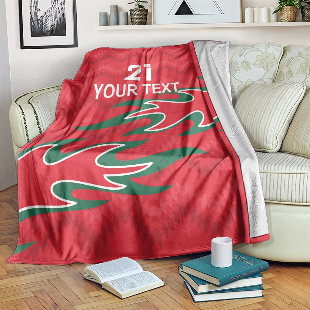 Red custom cricket blanket with green pattern and white “YOUR TEXT” and “21”