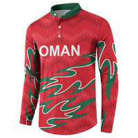 Red cricket button sweatshirt with green side flame graphics and OMAN logo, long sleeves