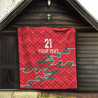 Red quilt on porch wall, diamond stitching, number 21 and YOUR TEXT, green dragon design