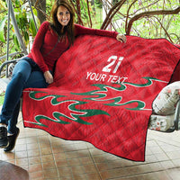 Red quilt held on patio, diamond quilting, number 21 and YOUR TEXT, green dragon motif