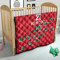 Red quilt on a crib, diamond quilting, number 21 and YOUR TEXT, green dragon motif