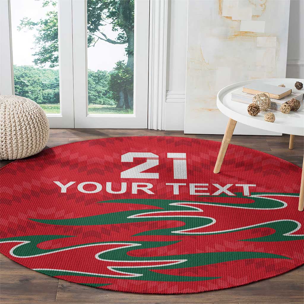 Red round carpet with 21 and 'YOUR TEXT' and green graphic, close-up view