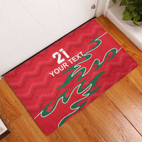 Red rubber doormat with 21 and your text, green flame-like graphic